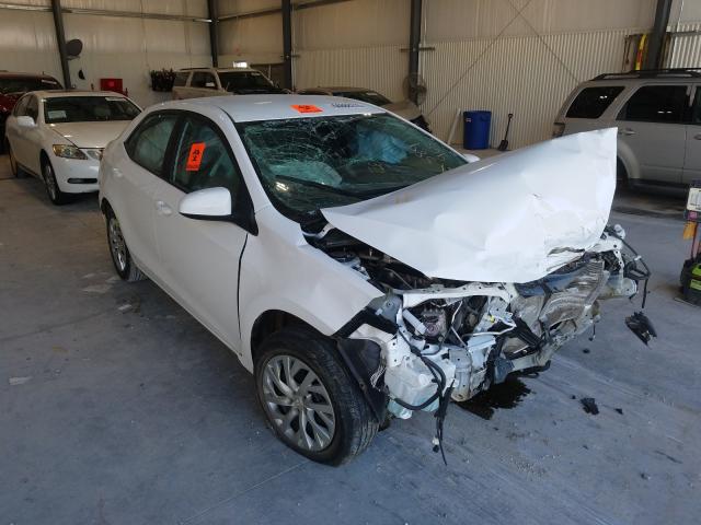 TOYOTA COROLLA L 2018 with VIN 5YFBURHEXJP758873 - Photo from auction