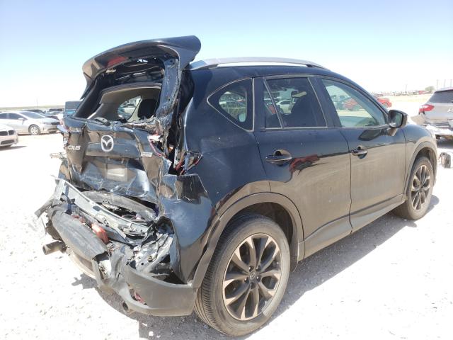 Photo 4 from auction – 2016 MAZDA CX-5 GT with VIN JM3KE2DY4G0623323