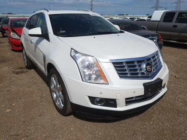 CADILLAC SRX PERFOR 2014 with VIN 3GYFNFE33ES577049 - Photo from auction