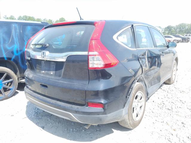 Photo 4 from auction – 2015 HONDA CR-V LX with VIN 3CZRM3H31FG713077