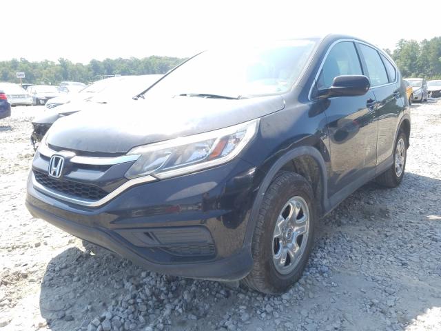 Photo 2 from auction – 2015 HONDA CR-V LX with VIN 3CZRM3H31FG713077