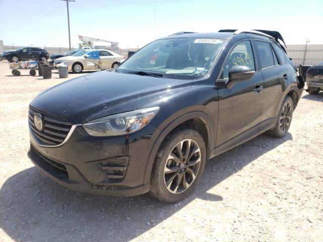 Photo 2 from auction – 2016 MAZDA CX-5 GT with VIN JM3KE2DY4G0623323