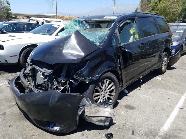 Photo 2 from auction – 2012 TOYOTA SIENNA XLE with VIN 5TDYK3DC3CS264088