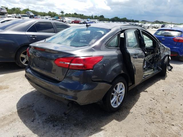 Photo 4 from auction – 2015 FORD FOCUS SE with VIN 1FADP3F22FL289435