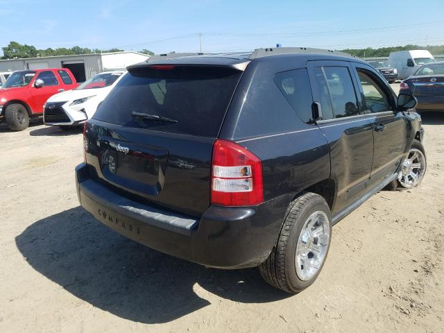 Photo 4 from auction – 2010 JEEP COMPASS with VIN 1J4NT4FA1AD531944