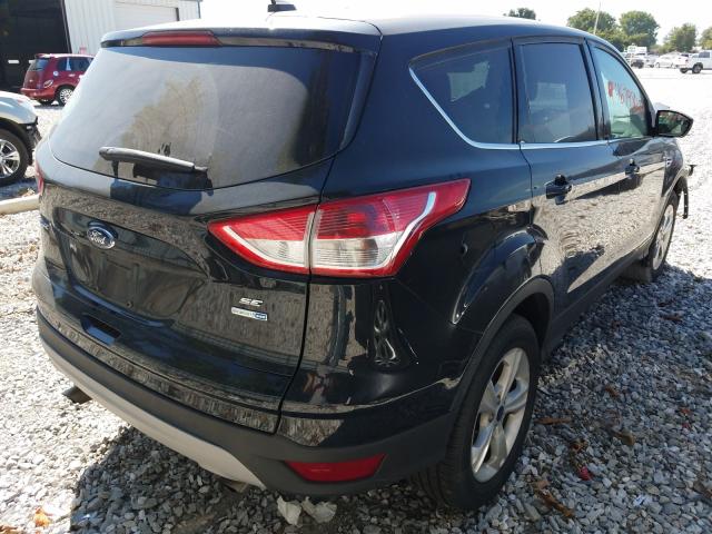 Photo 4 from auction – 2013 FORD ESCAPE SE with VIN 1FMCU9G98DUD72772