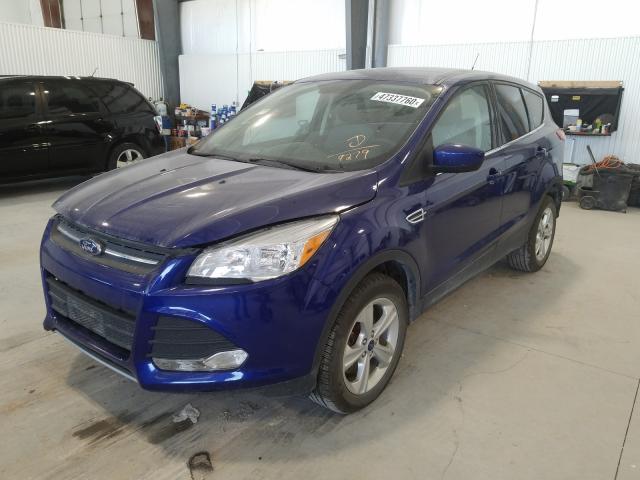 Photo 2 from auction – 2016 FORD ESCAPE SE with VIN 1FMCU9GX3GUC59279
