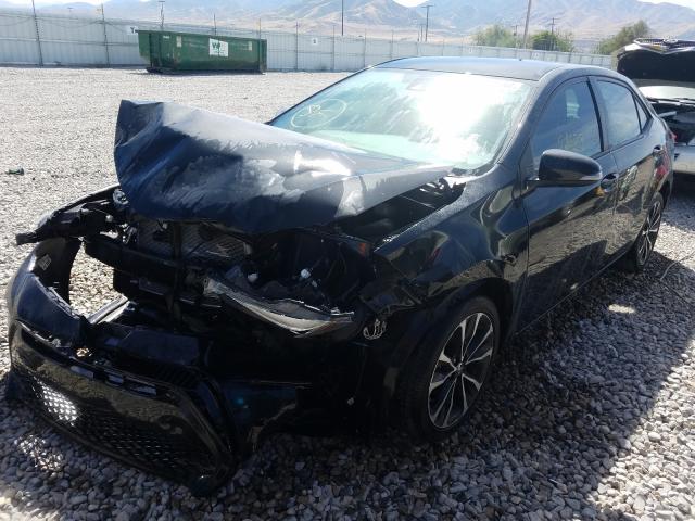 Photo 2 from auction – 2018 TOYOTA COROLLA L with VIN 2T1BURHE9JC064840