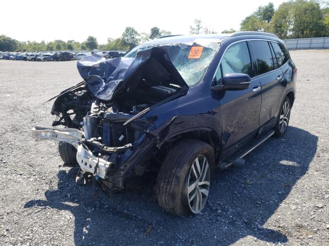 Photo 2 from auction – 2016 HONDA PILOT ELIT with VIN 5FNYF6H97GB024945