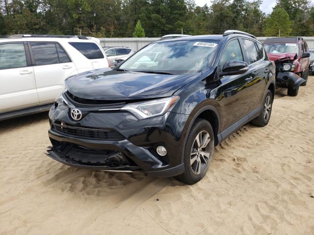 Photo 2 from auction – 2016 TOYOTA RAV4 XLE with VIN 2T3WFREV9GW240395