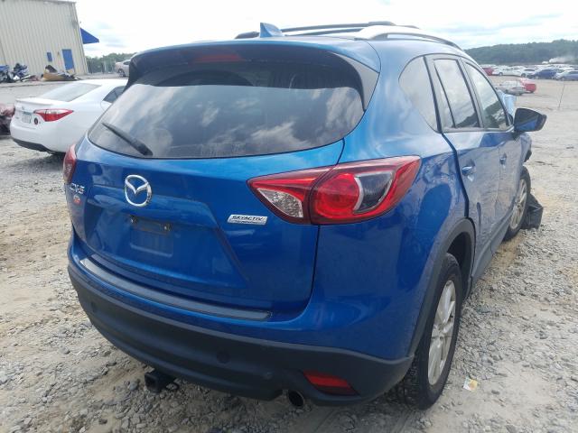 Photo 4 from auction – 2014 MAZDA CX-5 TOURI with VIN JM3KE2CYXE0366828