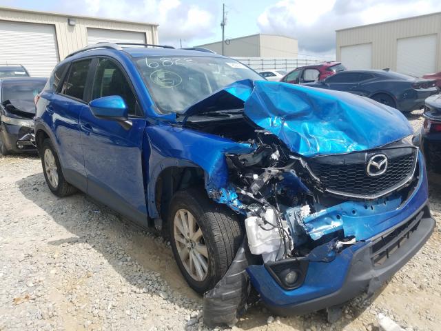 MAZDA CX-5 TOURI 2014 with VIN JM3KE2CYXE0366828 - Photo from auction