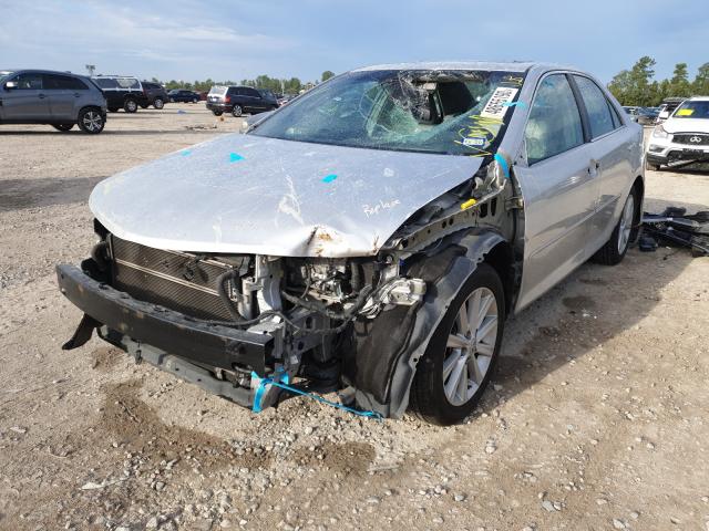 Photo 2 from auction – 2012 TOYOTA CAMRY HYBR with VIN 4T1BD1FK3CU037385