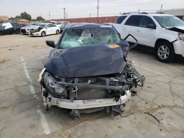 Photo 9 from auction – 2017 HONDA CIVIC LX with VIN 19XFC2E57HE045926