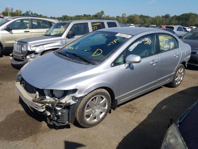 Photo 2 from auction – 2010 HONDA CIVIC LX with VIN 19XFA1F56AE057649