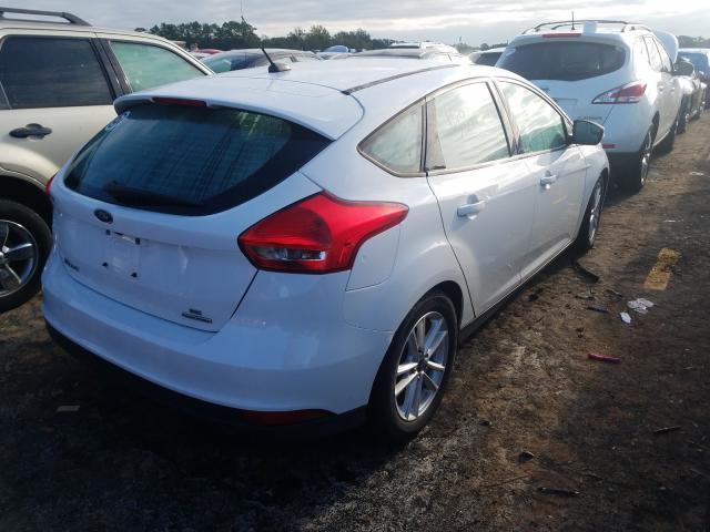 Photo 4 from auction – 2016 FORD FOCUS SE with VIN 1FADP3K27GL213765