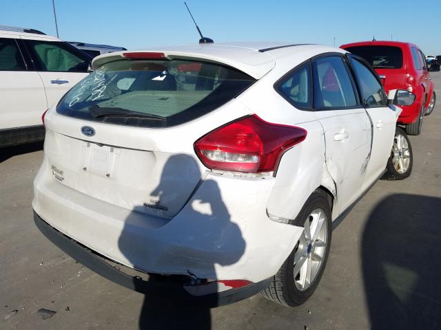 Photo 4 from auction – 2016 FORD FOCUS SE with VIN 1FADP3K22GL360656
