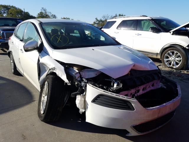 FORD FOCUS SE 2016 with VIN 1FADP3K22GL360656 - Photo from auction