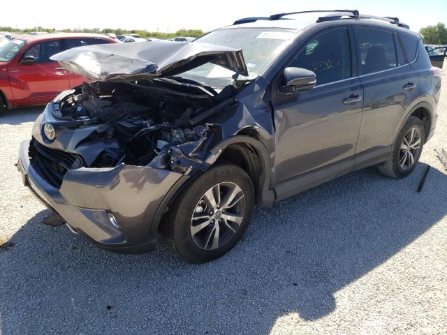 Photo 2 from auction – 2017 TOYOTA RAV4 XLE with VIN 2T3WFREV1HW326303