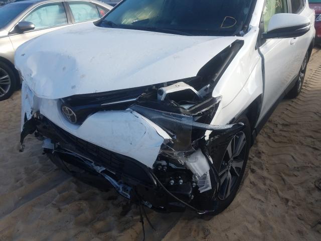 Photo 9 from auction – 2018 TOYOTA RAV4 ADVEN with VIN JTMRFREV9JD254377