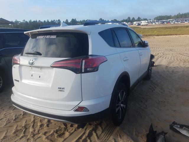 Photo 4 from auction – 2018 TOYOTA RAV4 ADVEN with VIN JTMRFREV9JD254377