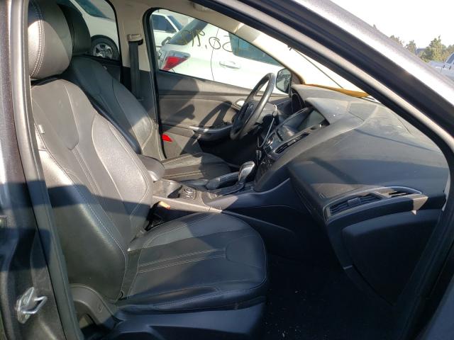 Photo 5 from auction – 2013 FORD FOCUS TITA with VIN 1FADP3N23DL353349