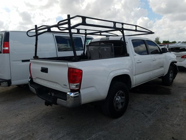 Photo 4 from auction – 2016 TOYOTA TACOMA DOU with VIN 3TMAZ5CN4GM023738