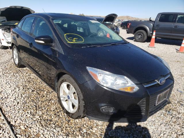 FORD FOCUS SE 2014 with VIN 1FADP3F22EL351334 - Photo from auction