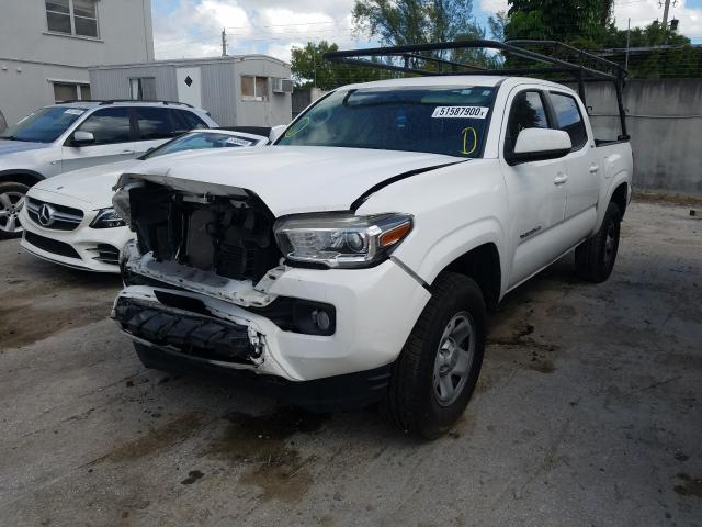 Photo 2 from auction – 2016 TOYOTA TACOMA DOU with VIN 3TMAZ5CN4GM023738