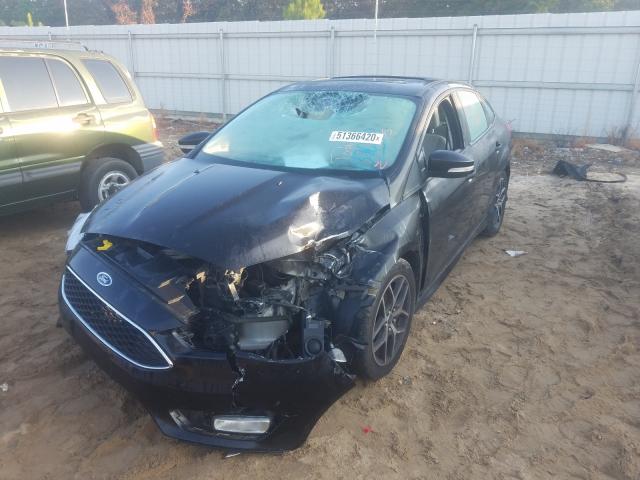 Photo 2 from auction – 2015 FORD FOCUS SE with VIN 1FADP3F28FL267553
