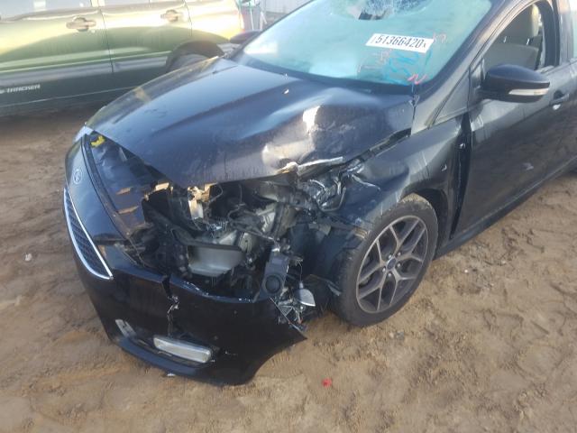 Photo 9 from auction – 2015 FORD FOCUS SE with VIN 1FADP3F28FL267553