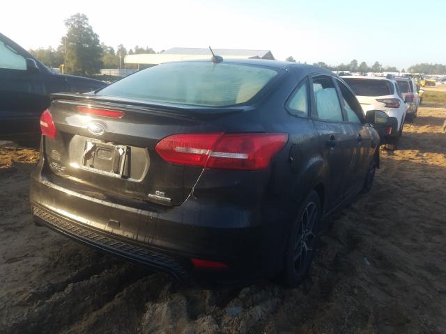 Photo 4 from auction – 2015 FORD FOCUS SE with VIN 1FADP3F28FL267553