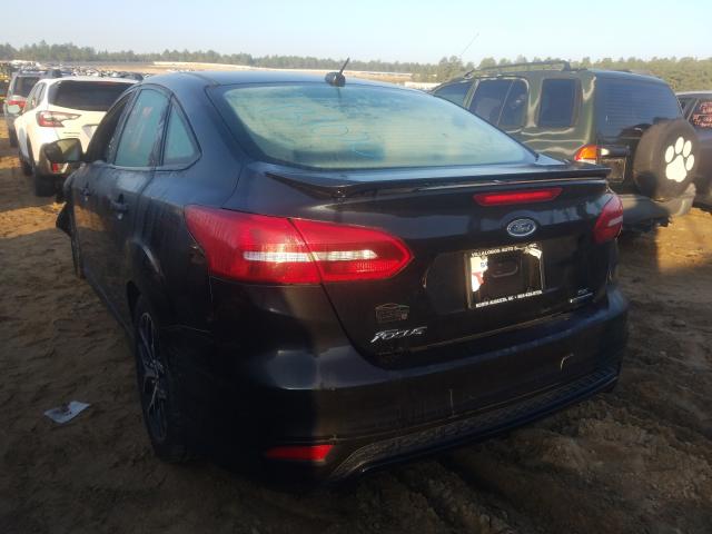 Photo 3 from auction – 2015 FORD FOCUS SE with VIN 1FADP3F28FL267553