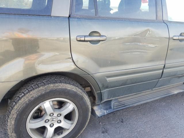 Photo 9 from auction – 2006 HONDA PILOT with VIN 2HKYF18546H519863
