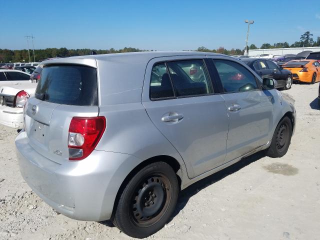 Photo 4 from auction – 2010 TOYOTA SCION XD with VIN JTKKU4B41AJ055131