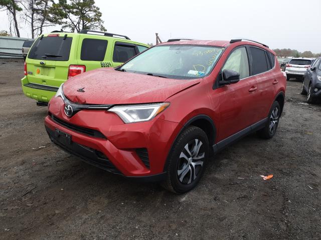 Photo 2 from auction – 2016 TOYOTA RAV4 LE with VIN JTMBFREV5GJ079377