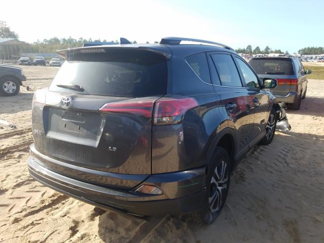 Photo 4 from auction – 2017 TOYOTA RAV4 LE with VIN JTMZFREVXHD099509