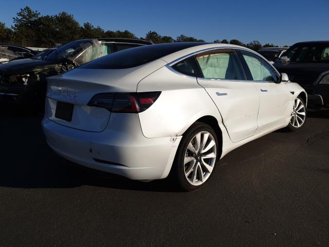 Снимка 4 от търг – 2020 TESLA MODEL 3 с VIN 5YJ3E1EA2LF509938