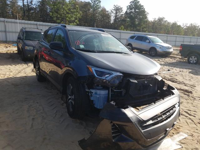 Photo 1 from auction – 2017 TOYOTA RAV4 LE with VIN JTMZFREVXHD099509