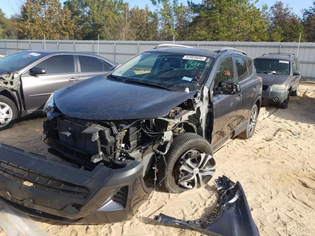 Photo 2 from auction – 2017 TOYOTA RAV4 LE with VIN JTMZFREVXHD099509