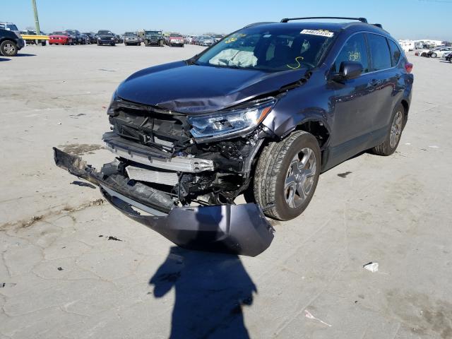 Photo 2 from auction – 2017 HONDA CR-V EXL with VIN 7FARW1H8XHE035250