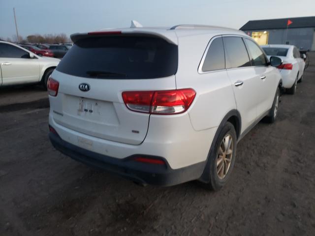Photo 4 from auction – 2016 KIA SORENTO LX with VIN 5XYPG4A37GG075342