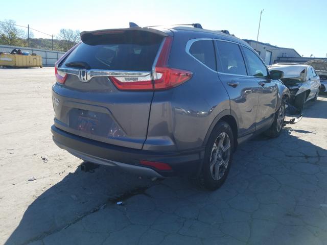 Photo 4 from auction – 2017 HONDA CR-V EXL with VIN 7FARW1H8XHE035250