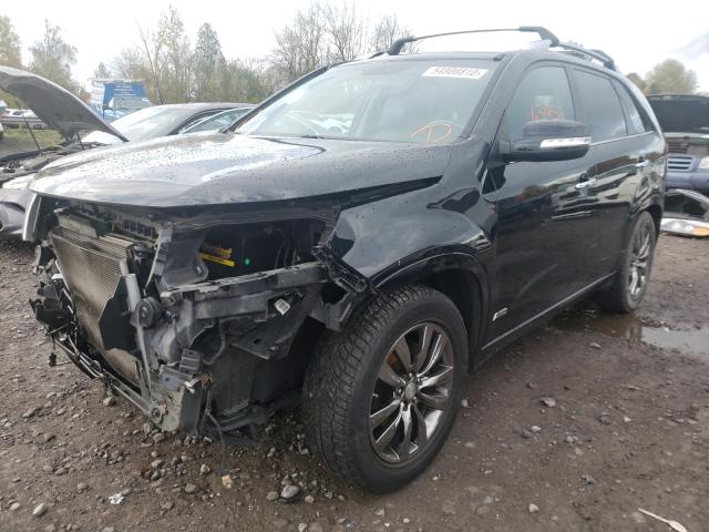 Photo 2 from auction – 2012 KIA SORENTO SX with VIN 5XYKWDA25CG308620
