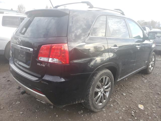 Photo 4 from auction – 2012 KIA SORENTO SX with VIN 5XYKWDA25CG308620