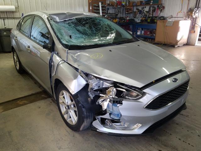 FORD FOCUS SE 2016 with VIN 1FADP3F20GL379894 - Photo from auction
