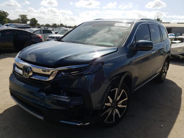 Photo 2 from auction – 2019 HONDA PILOT TOUR with VIN 5FNYF5H68KB041956