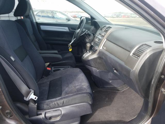Photo 5 from auction – 2011 HONDA CR-V with VIN 5J6RE4H41BL110543