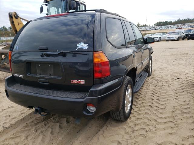 Photo 4 from auction – 2004 GMC ENVOY with VIN 1GKDS13S642361455