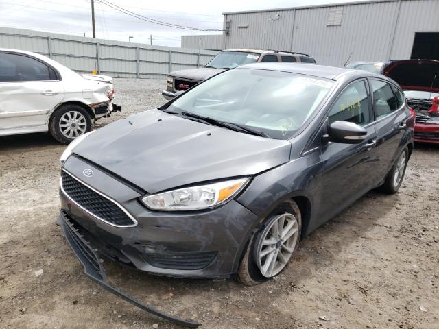 Photo 2 from auction – 2017 FORD FOCUS SE with VIN 1FADP3K23HL306302